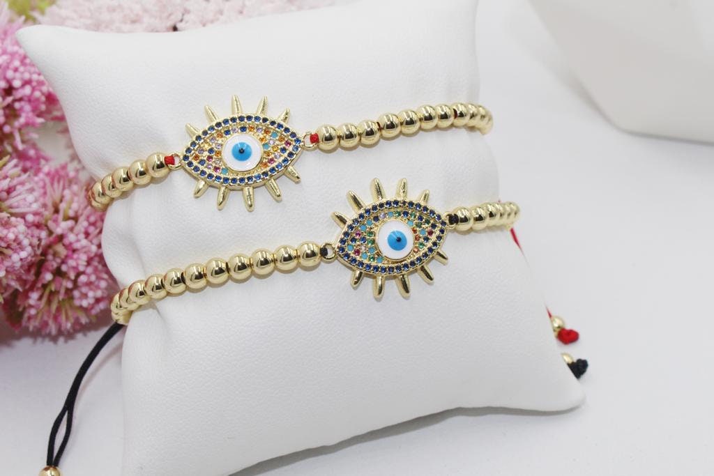 Beaded Bracelet with Colorful Cubic Zirconia Eye Pendant