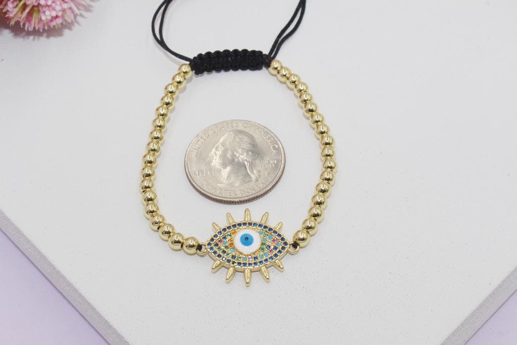 Beaded Bracelet with Colorful Cubic Zirconia Eye Pendant