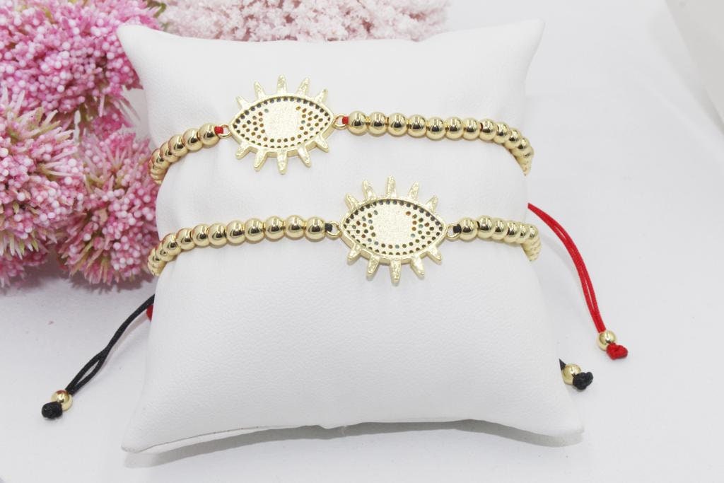 Beaded Bracelet with Colorful Cubic Zirconia Eye Pendant