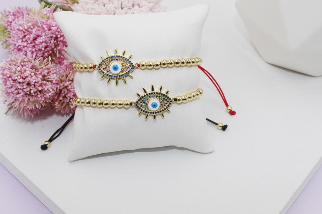 Beaded Bracelet with Colorful Cubic Zirconia Eye Pendant