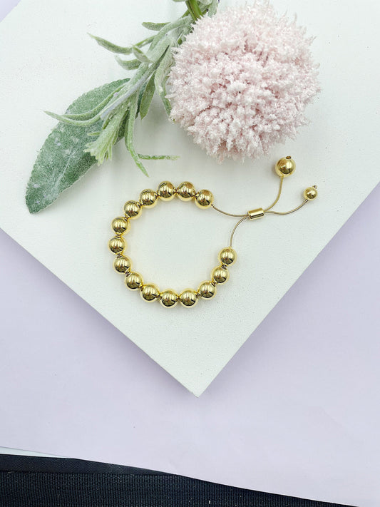 Large Golden Balls With Adjusting Lock Bracelet