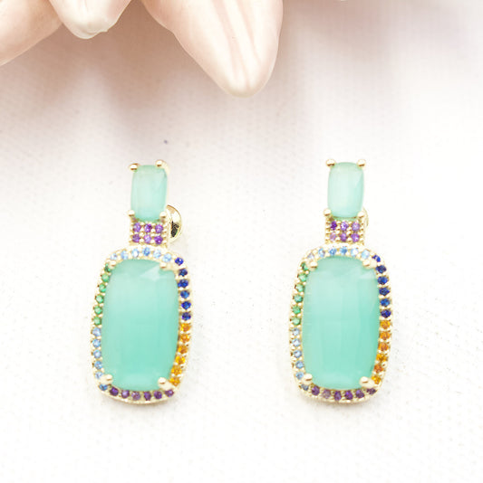 Turquoise Stone With Colored Rhinestones Around Stud Earrings